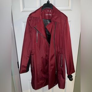 Red Calvin Klein trench coat